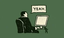 a man looking at his computer and saying yeah