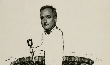 Diego Megia holding a spade in a hole
