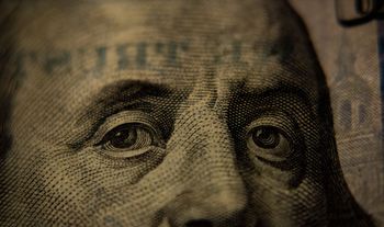 eyes on dollar bill