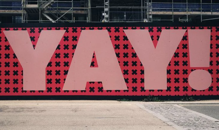 a sign that says YAY