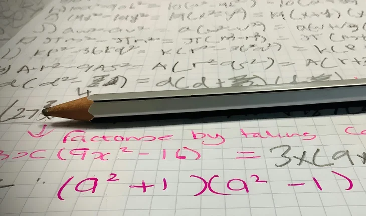 Math equation and pencil