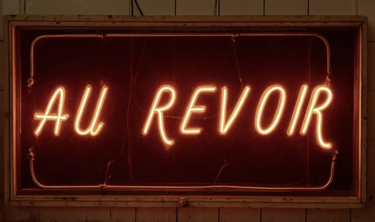 a sign that says au revoir