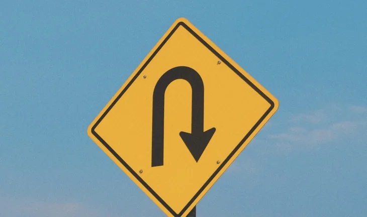 a u turn sign 