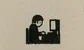 a student staring at a screen with a gold square in the background